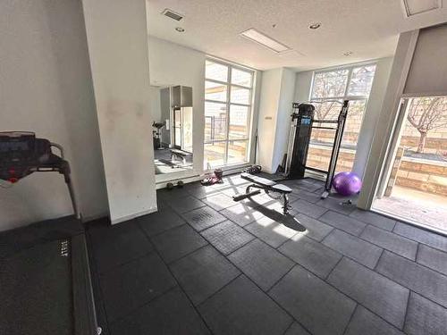 1208-325 3 Street Se, Calgary, AB - Indoor Photo Showing Gym Room