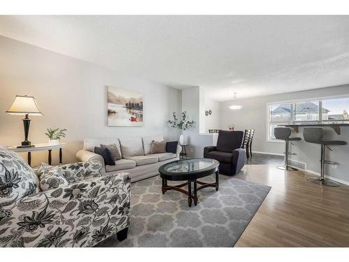 191 Mckenzie Towne Gate Se, Calgary, AB - Indoor Photo Showing Living Room