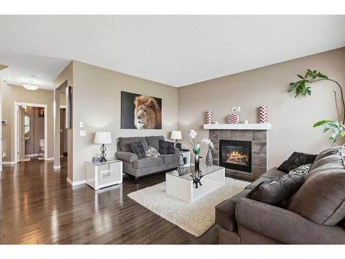 2168 Brightoncrest Green Se, Calgary, AB - Indoor Photo Showing Living Room With Fireplace