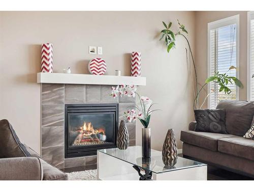 2168 Brightoncrest Green Se, Calgary, AB - Indoor Photo Showing Living Room With Fireplace