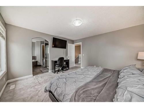 144 Cove Rise, Chestermere, AB - Indoor Photo Showing Bedroom