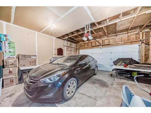 144 Cove Rise, Chestermere, AB - Indoor Photo Showing Garage