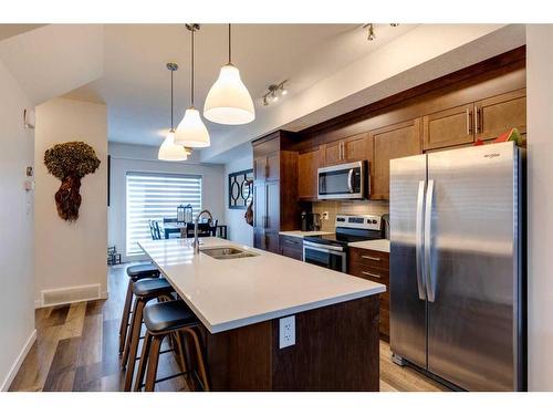 116 Shawnee Common Sw, Calgary, AB - Indoor Photo Showing Kitchen