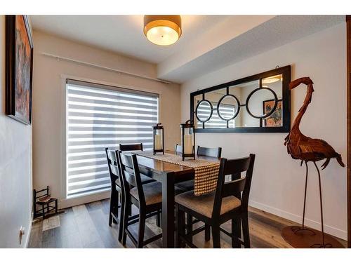 116 Shawnee Common Sw, Calgary, AB - Indoor Photo Showing Dining Room