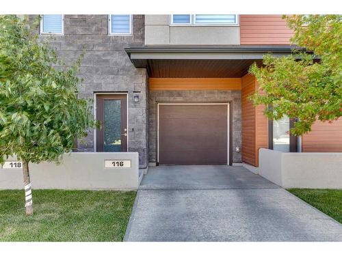 116 Shawnee Common Sw, Calgary, AB - Outdoor