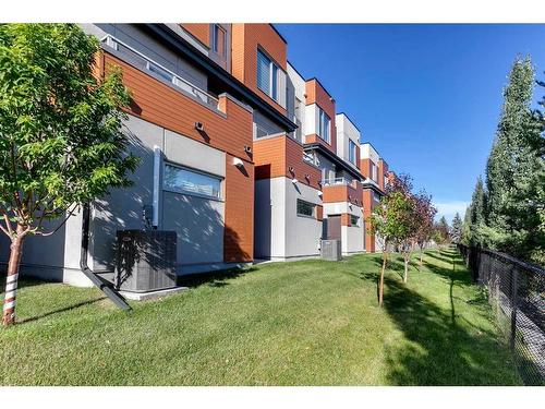 116 Shawnee Common Sw, Calgary, AB - Outdoor