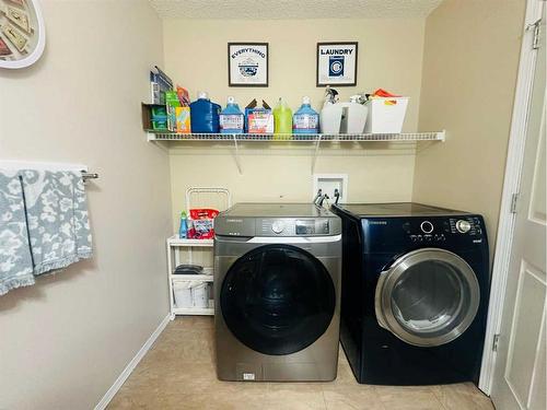 112 Silverado Plains View Sw, Calgary, AB - Indoor Photo Showing Laundry Room