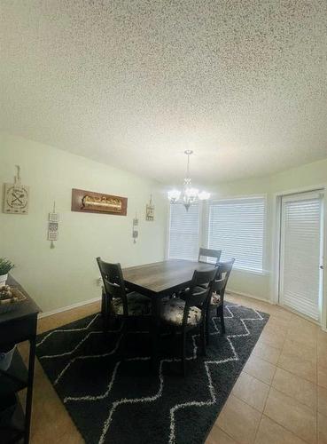 112 Silverado Plains View Sw, Calgary, AB - Indoor Photo Showing Dining Room