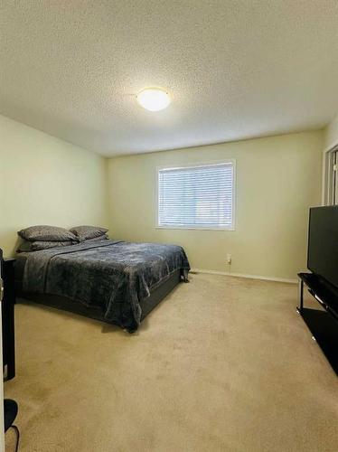 112 Silverado Plains View Sw, Calgary, AB - Indoor Photo Showing Bedroom