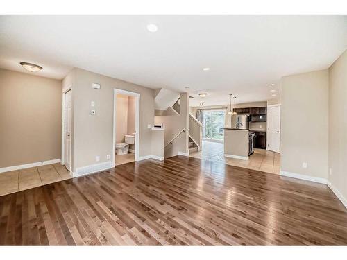 99 Panatella Park Nw, Calgary, AB - Indoor Photo Showing Living Room