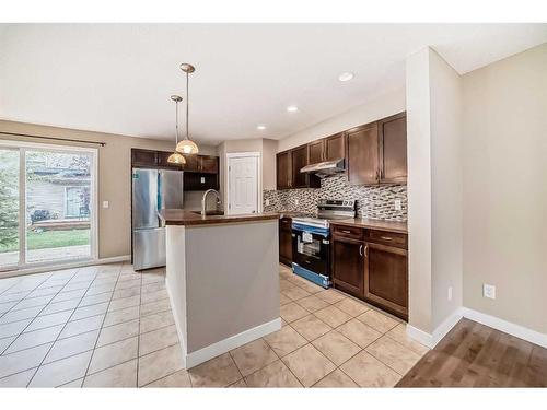 99 Panatella Park Nw, Calgary, AB - Indoor Photo Showing Kitchen