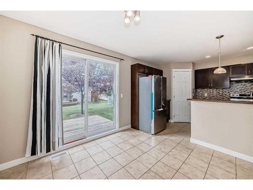 99 Panatella Park Nw, Calgary, AB - Indoor Photo Showing Kitchen