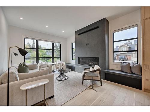 608 Willow Brook Drive Se, Calgary, AB - Indoor Photo Showing Living Room With Fireplace