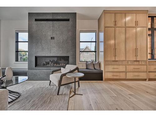 608 Willow Brook Drive Se, Calgary, AB - Indoor Photo Showing Living Room With Fireplace