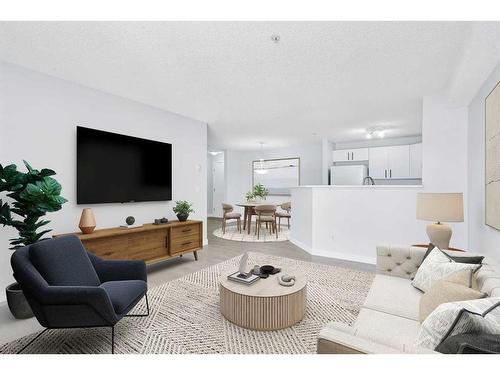 1221-8810 Royal Birch Boulevard Nw, Calgary, AB - Indoor Photo Showing Living Room