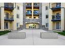 1402-8810 Royal Birch Boulevard Nw, Calgary, AB  - Outdoor With Facade 