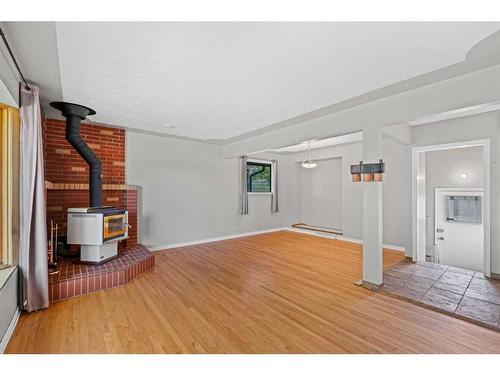 209 Windermere Road Sw, Calgary, AB - Indoor Photo Showing Other Room