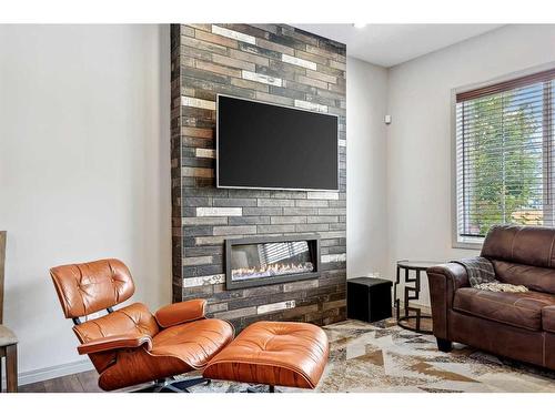 241 Mahogany Parade Se, Calgary, AB - Indoor Photo Showing Living Room With Fireplace