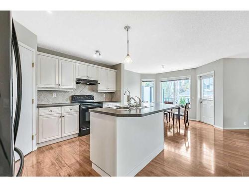 41 Bridlecreek Park Sw, Calgary, AB - Indoor Photo Showing Kitchen