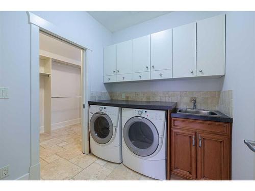 67 Discovery Valley Cove Sw, Calgary, AB - Indoor Photo Showing Laundry Room