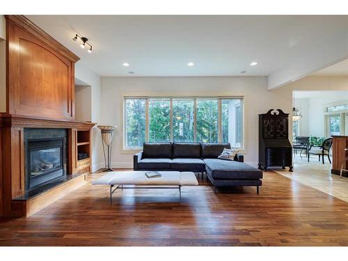 67 Discovery Valley Cove Sw, Calgary, AB - Indoor Photo Showing Living Room With Fireplace