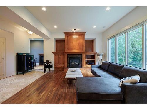 67 Discovery Valley Cove Sw, Calgary, AB - Indoor Photo Showing Living Room With Fireplace