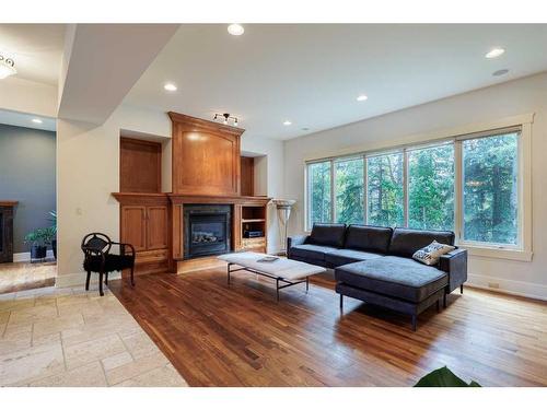 67 Discovery Valley Cove Sw, Calgary, AB - Indoor Photo Showing Living Room With Fireplace