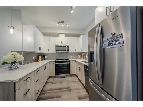 436-301 Redstone Boulevard Ne, Calgary, AB - Indoor Photo Showing Kitchen With Upgraded Kitchen