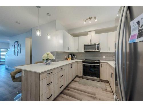 436-301 Redstone Boulevard Ne, Calgary, AB - Indoor Photo Showing Kitchen With Upgraded Kitchen