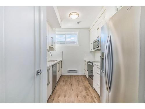 554 Rangeview Street Se, Calgary, AB - Indoor Photo Showing Kitchen With Stainless Steel Kitchen