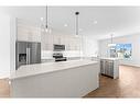 554 Rangeview Street Se, Calgary, AB  - Indoor Photo Showing Kitchen With Stainless Steel Kitchen With Upgraded Kitchen 