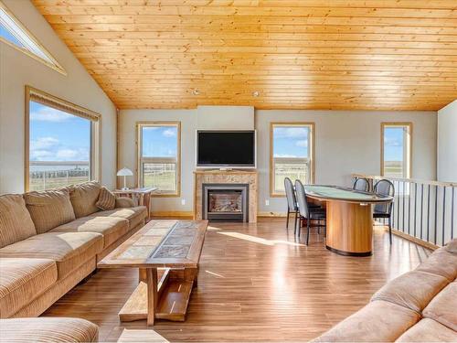 1-185006 Range Road 220, Rural Vulcan County, AB - Indoor Photo Showing Living Room With Fireplace