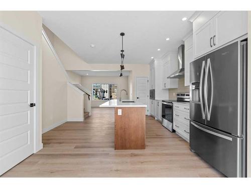 734 Bayview Hill Sw, Airdrie, AB - Indoor Photo Showing Kitchen With Stainless Steel Kitchen With Upgraded Kitchen