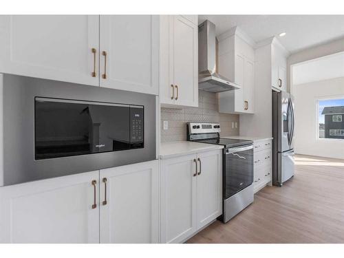 734 Bayview Hill Sw, Airdrie, AB - Indoor Photo Showing Kitchen With Stainless Steel Kitchen