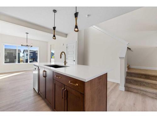 734 Bayview Hill Sw, Airdrie, AB - Indoor Photo Showing Kitchen With Upgraded Kitchen