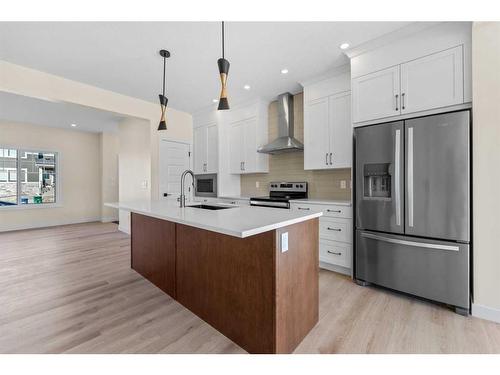 734 Bayview Hill Sw, Airdrie, AB - Indoor Photo Showing Kitchen With Stainless Steel Kitchen With Upgraded Kitchen