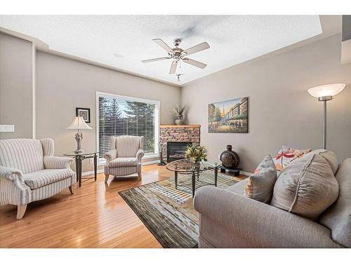 19 Rocky Vista Terrace Nw, Calgary, AB - Indoor Photo Showing Living Room With Fireplace