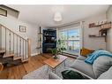 8-810 2 Street Ne, Calgary, AB  - Indoor Photo Showing Living Room With Fireplace 