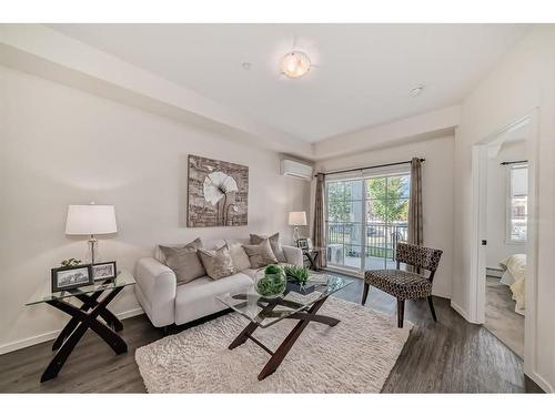 8119-151 Legacy Main Street Se, Calgary, AB - Indoor Photo Showing Living Room