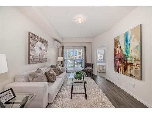 8119-151 Legacy Main Street Se, Calgary, AB - Indoor Photo Showing Living Room