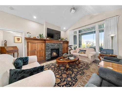 47 Cimarron Estates Road, Okotoks, AB - Indoor Photo Showing Living Room With Fireplace