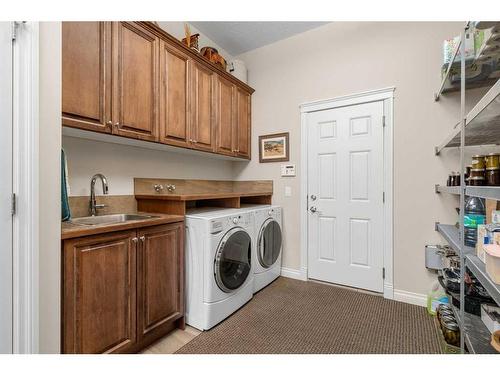 47 Cimarron Estates Road, Okotoks, AB - Indoor Photo Showing Laundry Room