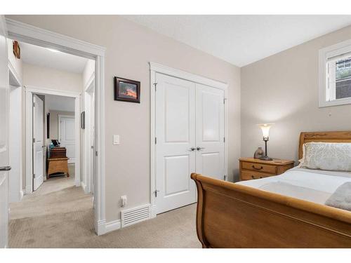 47 Cimarron Estates Road, Okotoks, AB - Indoor Photo Showing Bedroom