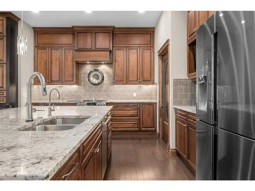 47 Cimarron Estates Road, Okotoks, AB - Indoor Photo Showing Kitchen With Double Sink With Upgraded Kitchen