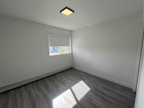 16-2020 16 Avenue Nw, Calgary, AB - Indoor Photo Showing Other Room