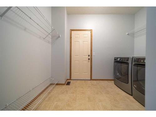 136 New Brighton Lane Se, Calgary, AB - Indoor Photo Showing Laundry Room