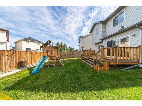 136 New Brighton Lane Se, Calgary, AB - Outdoor With Deck Patio Veranda With Backyard