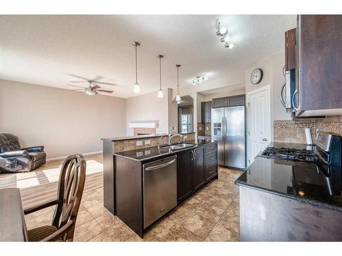 133 Panatella Parade Nw, Calgary, AB - Indoor Photo Showing Kitchen With Stainless Steel Kitchen With Double Sink With Upgraded Kitchen