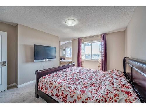 133 Panatella Parade Nw, Calgary, AB - Indoor Photo Showing Bedroom