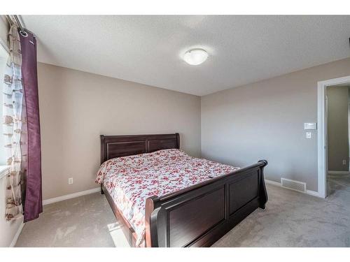 133 Panatella Parade Nw, Calgary, AB - Indoor Photo Showing Bedroom